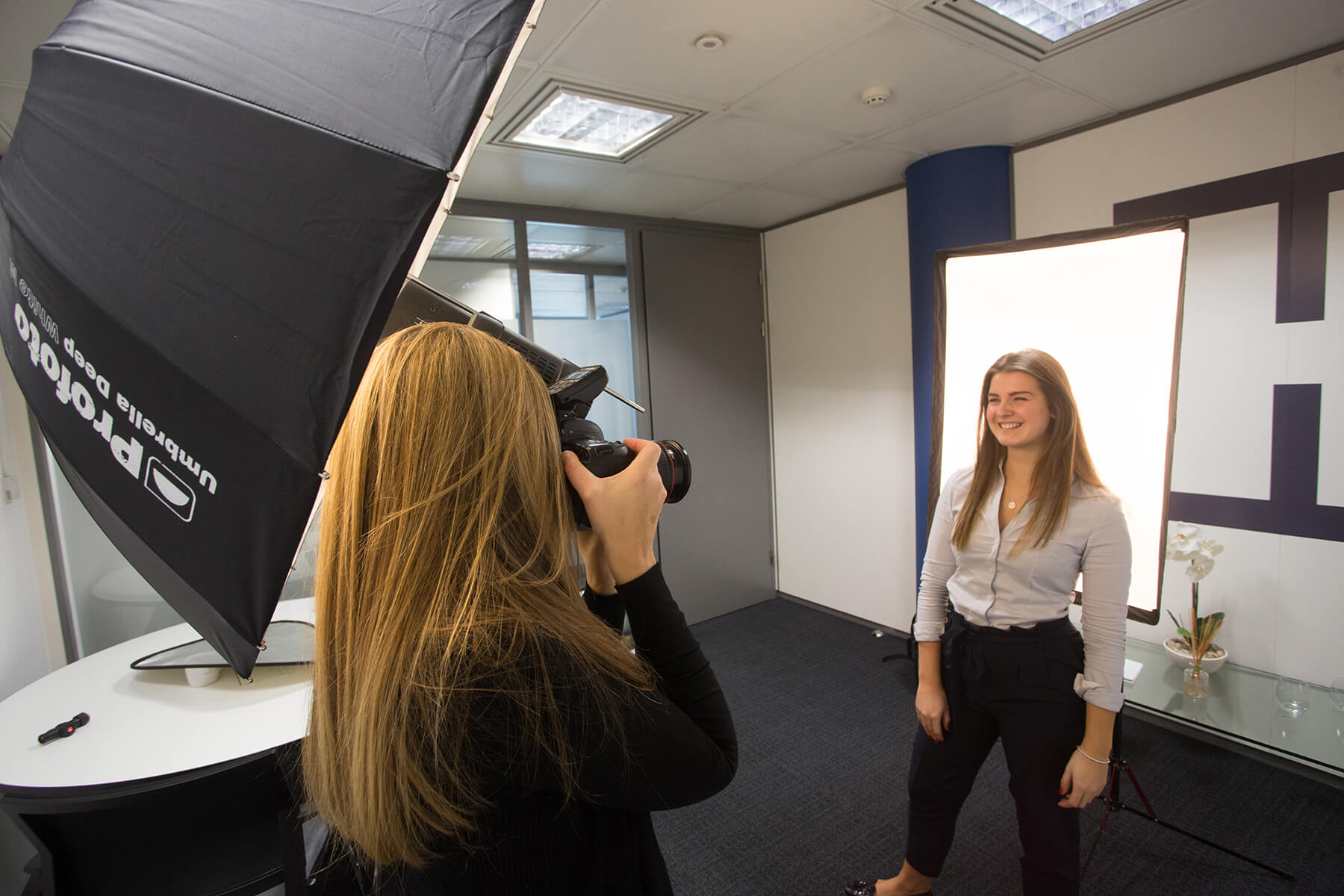 Hannah Couzens photographs a subject for Profoto Academy