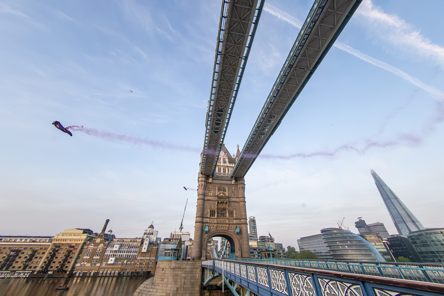 Marco Waltenspiel and Marco Fuerst of Austria fly through Tower Bridge in London, Great Britain on May 12, 2024.